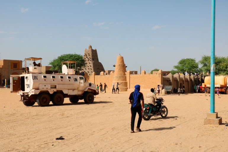 ap_6a2676dcda5e6-1780905692 FILE - United Nations forces patrol the streets of Timbuktu, Mali, on Sept. 26, 2021. In June 2023, pressure from Mali's military government spurred the U.N. to end their peacekeeping mission, which has played a role in safeguarding civilians from armed groups, aiding logistics for local aid organizations, negotiating a peace deal with Tuareg rebels, and doling out contracts to individuals and businesses to assist its operations. (AP Photo/Moulaye Sayah, File)