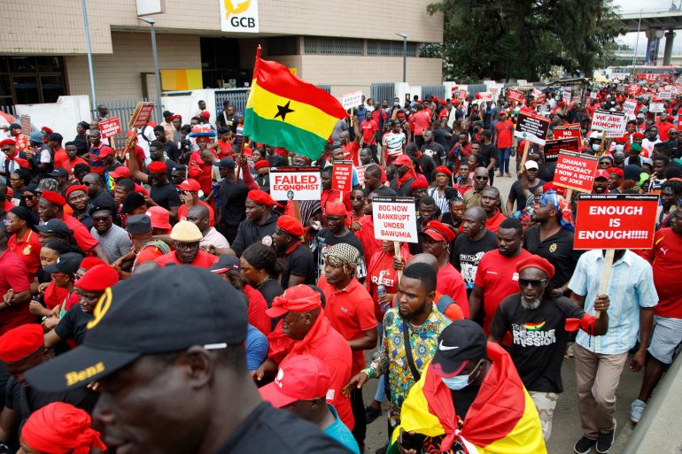 ap_6a26934772aad-1780912967 Thousands participate in a protest in Accra, Ghana, demanding the resignation of the Bank of Ghana's Governor, Dr Ernest Addison, alongside his two deputies, Tuesday, Oct. 3, 2023. (AP Photo/Misper Apawu)