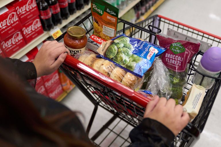 ap_6a293880de37b-1781086336 FILE - Jaqueline Benitez, who depends on California's SNAP benefits to help pay for food, shops for groceries at a supermarket in Bellflower, Calif., Feb. 13, 2023. (AP Photo/Allison Dinner, File)