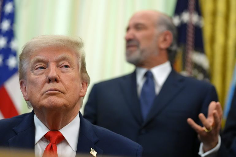 ap_6a2be0f40046a-1781260532 Commerce Secretary Howard Lutnick speaks before President Donald Trump, in foreground, signs a proclamation about the fishing industry, in the Oval Office of the White House, Thursday, June 11, 2026, in Washington. (AP Photo/Jacquelyn Martin)