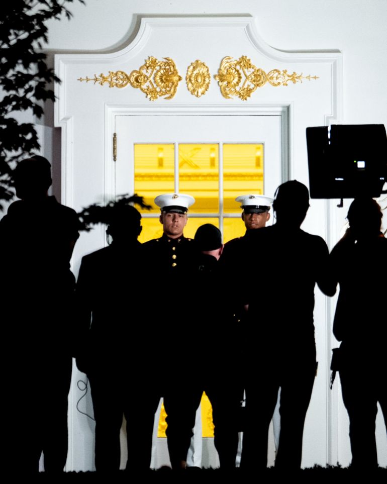 ap_6a32a7222fec2-1781704482 U.S. Marines stand in front of the doors to the Oval Office as a film crew waits for lightweight Justin Gaethje to walk the Colonnade during UFC Freedom 250, on the South Lawn of the White House, Monday, June 15, 2026, in Washington. (AP Photo/Julia Demaree Nikhinson)