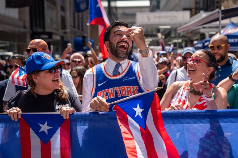 ap_6a33d0fa04f63-1781780730 New York City Mayor Zohran Mamdani takes part in the National Puerto Rican Day Parade, Sunday, June 14, 2026 in New York. (AP Photo/Adam Gray)
