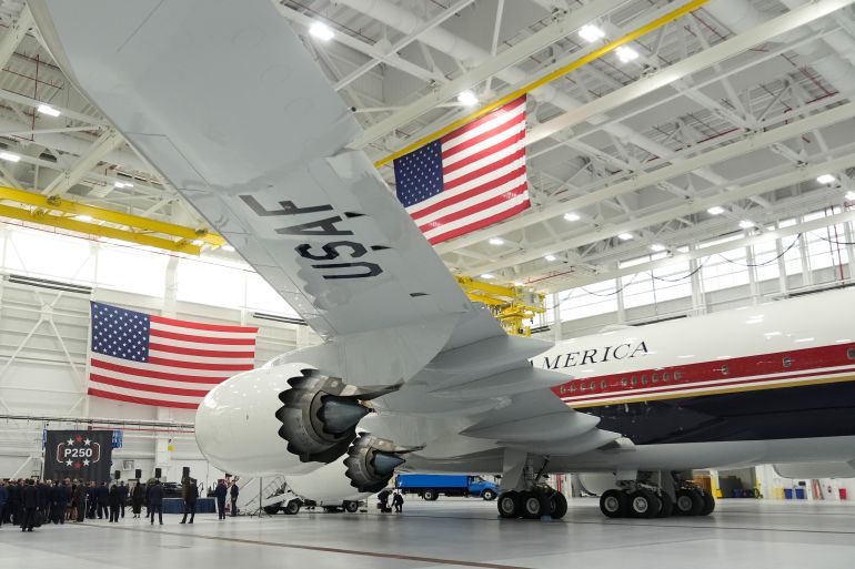 ap_6a35bf6196687-1781907297 The newly designated Air Force One presidential aircraft sits in a hangar following a tour by President Donald Trump at Joint Base Andrews, Md., Friday, June 19, 2026. (AP Photo/Manuel Balce Ceneta)