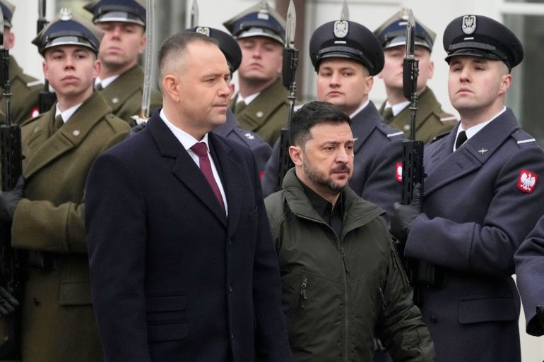 FILE - Polish President Karol Nawrocki, left, and Ukrainian President Volodymyr Zelenskyy attend an official welcome ceremony before their meeting at the Presidential Palace in Warsaw, Poland, Dec. 19, 2025. (AP Photo/Czarek Sokolowski, File)