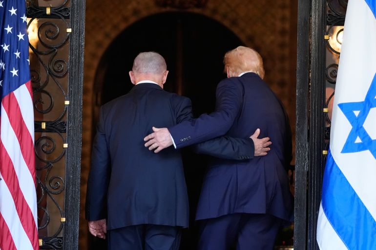 ap_6a38e1751dc79-1782112629 FILE - President Donald Trump and Israel's Prime Minister Benjamin Netanyahu walk into Trump's Mar-a-Lago club, Dec. 29, 2025, in Palm Beach, Fla., after an arrival greeting. (AP Photo/Alex Brandon, File)
