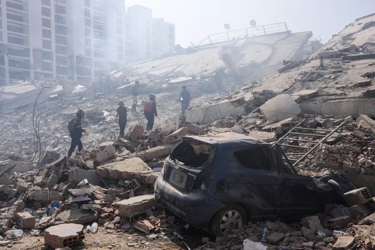 Rescue workers search through the rubble three days after earthquakes struck La Guaira, Venezuela, Saturday, June 27, 2026. (AP Photo/Matias Delacroix)