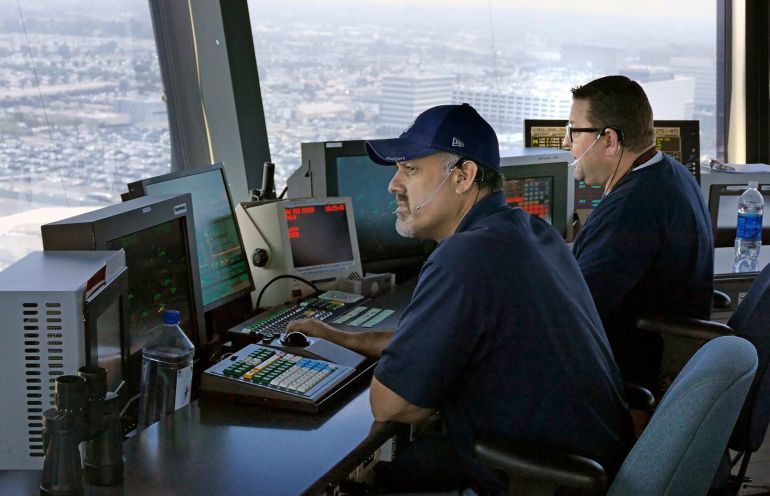 asdasd-1782203424 LOS ANGELES, CA - June 24: At Los Angeles International Airport FAA officials gave a media tour for a new communications system between air traffic controllers and pilots. Data Comm as it is called, is a texting system that replaces some voice radio communications that is prone to errors. It is expected to shave minutes off flights, cut down on travel delays and be more accurate. (Photo by Brad Graverson/MediaNews Group/Torrance Daily Breeze via Getty Images)