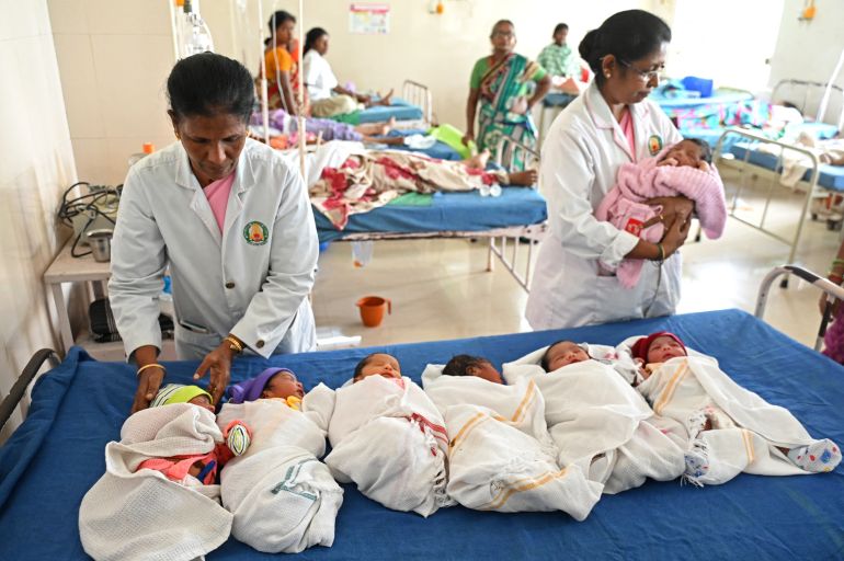 Newborn babies are pictured inside a ward of a government hospital for women and children on the occasion of World Population Day, in Chennai on July 11, 2023. (Photo by R. Satish BABU / AFP)