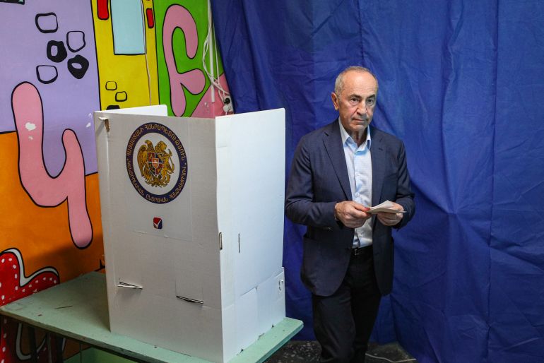 epa_6a267964b2b9-1780906340 epa13021671 Leader of the Armenia alliance Robert Kocharyan casts his vote in parliamentary elections at a polling station in Yerevan, Armenia, 07 June 2026. Voting is taking place at more than 2,000 polling stations. Sixteen parties and two blocs are competing for seats in the National Assembly. EPA/VAHRAM BAGHDASARYANPHOTOLURE