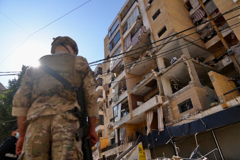 epa_6a26f5642e48-1780938084 epa13022475 An army soldier stands at the site of an Israeli airstrike targeting an apartment in the southern suburbs of Beirut, Lebanon, 07 June 2026. At least two people were killed and a dozen injured in an Israeli strike on southern Beirut's suburbs, according to the Lebanese official news agency (NNA). EPA/ABBAS SALMAN
