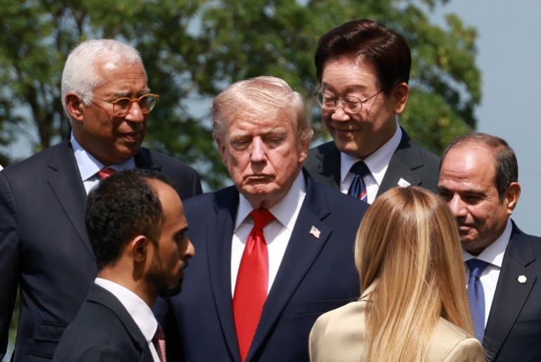 epa13041368 (L-R) European Council President Antonio Costa, US President Donald Trump, South Korean President Lee Jae Myung, Italy's Prime Minister Giorgia Meloni, and Egyptian President Abdel Fattah el-Sisi prepare for a group picture at Hotel Royal during the G7 Summit in Evian-les-Bains, France, 16 June 2026. The 52nd G7 Summit takes place in Evian-les-Bains from 15 to 17 June 2026. EPA/YONHAP SOUTH KOREA OUT