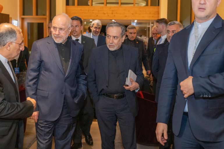 epa_6a376b4aab03-1782016842 epa13052908 Iran's Speaker of the Islamic Parliament, Mohammed Bagher Ghalibaf (L), and the Minister of Foreign Affairs of Iran, Seyyed Abbas Araghchi (C), attend a meeting at the Bürgenstock resort in Obbürgen, near Lucerne, Switzerland, Sunday, 21 June 2026. Following the signing of a framework agreement on peace in France this week, delegations from the USA and Iran meet at the Bürgenstock resort to discuss further details and technical issues. EPA/URS FLUEELER