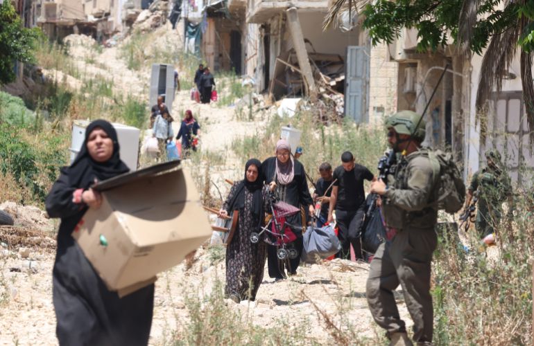 epa_6a3bc2c431d1-1782301380 epa13043854 Displaced Palestinians carry their belongings through through theTulkarem refugee camp in the West Bank city of Tulkarm, 17 June 2026, as the Israeli military continues its long-term deployment across the city and its two refugee camps. EPA/ALAA BADARNEH