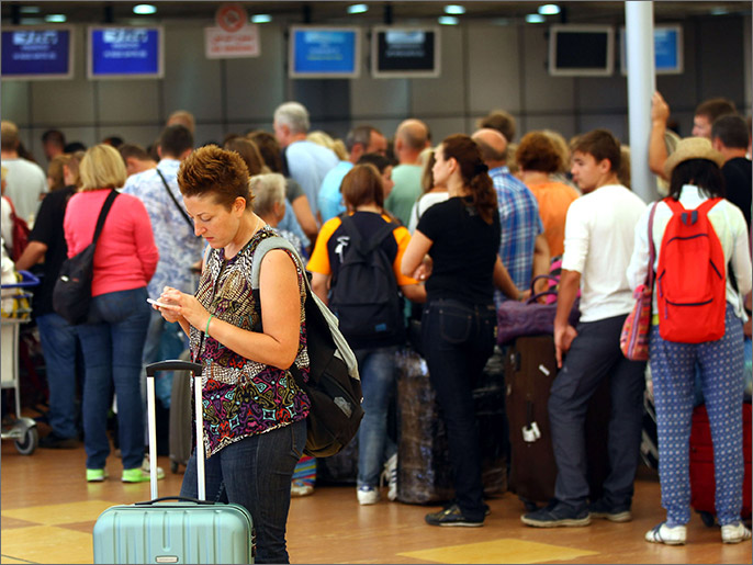 f5e6e8ab-b05f-4a0f-bcd5-dab239db090c epa05013901 Airline passengers queue at check-in counters at Sharm el-Sheikh airport, in Sharm el-Sheikh, Egypt, 06 November 2015. Airlines will begin flying stranded British tourists home 06 November after the government in London permitted flights from Egypt's Sharm el-Sheikh resort to resume. Earlier, British Prime Minister David Cameron maintained that the crash of a Russian passenger jet, which killed 224 people in Egypt, was 'more likely than not' caused by a bomb, despite Russian and Egyptian leaders' calls for all sides to await results of an official investigation. EPA/KHALED ELFIQI