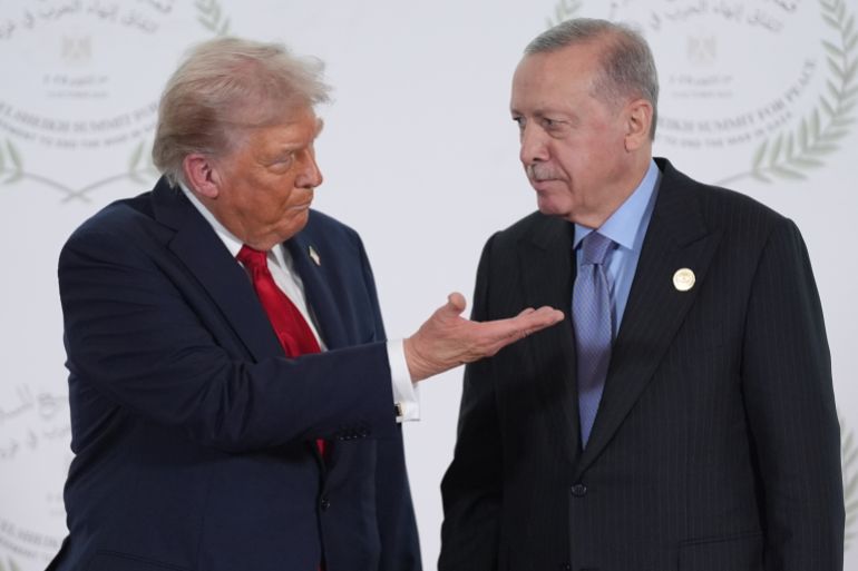 SHARM EL SHEIKH, EGYPT - OCTOBER 13: U.S. President Donald Trump (R) greets Turkey's President Recep Tayyip Erdogan during a summit of European and Middle Eastern leaders on October 13, 2025 in Sharm El Sheikh, Egypt. President Trump is in Egypt to meet with European and Middle Eastern leaders in what’s being billed as an international peace summit, following the start of a US-brokered ceasefire deal to end the war in the Gaza Strip. (Photo by Evan Vucci - Pool/Getty Images)