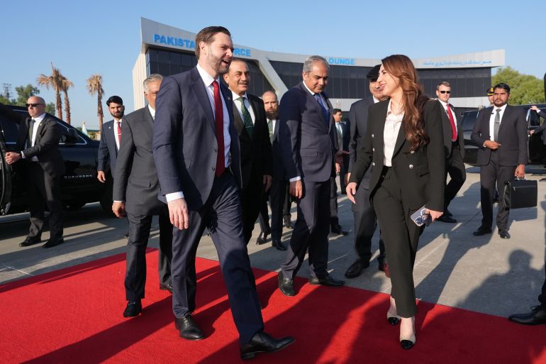 ISLAMABAD, PAKISTAN - APRIL 12: Vice President JD Vance walks with Pakistani Deputy Prime Minister and Foreign Minister Mohammad Ishaq Dar, partially seen on the left, Pakistan's Chief of Defence Forces and Chief of Army Staff Field Marshall Asim Munir, third left, Pakistan's Interior Minister Mohsin Naqvi, and Charge d'Affaires of the U.S. Embassy in Islamabad Natalie A. Baker, right, before boarding Air Force Two after attending talks on Iran on April 12, 2026 in Islamabad, Pakistan. (Photo by Jacquelyn Martin - Pool/Getty Images)