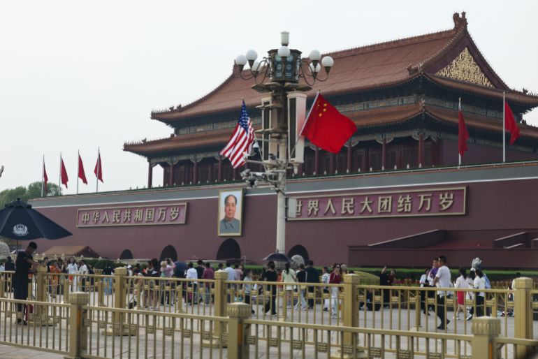 BEIJING, CHINA - MAY 13: The national flags of the United States and China hang on In front of Tiananmen Gate on May 13, 2026 in Beijing, China. President Donald Trump will arrive in Beijing on May 13th for a two day summit with Chinese President Xi Jinping. It will be the first visit to China by a U.S. President since Trump's last visit in 2017. (Photo by Lintao Zhang/Getty Images)