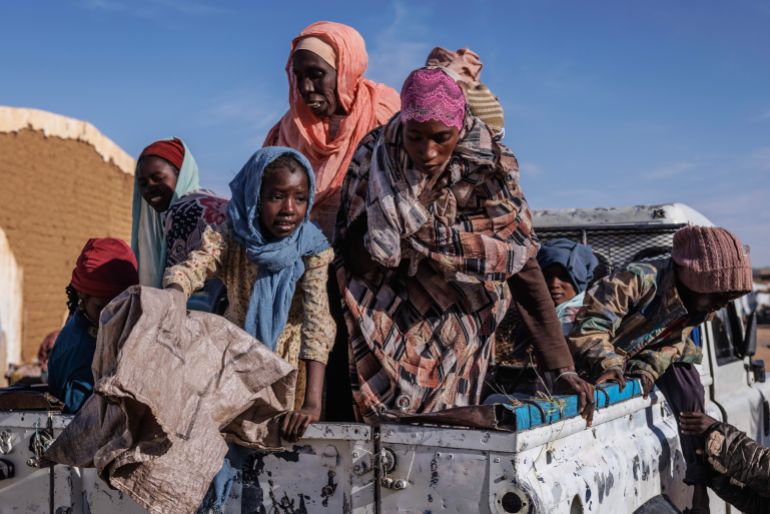 getty_6a0b4f9fe5-1779126175 OURE CASSONI, CHAD - FEBRUARY 24: Recently arrived Sudanese refugees arrive at a food distribution centre at the Oure Cassoni refugee camp on February 24, 2026 in Oure Cassoni, Chad. In April 2023 civil war erupted between the Sudanese Armed Forces (SAF) and the armed militia group Rapid Support Forces (RSF). The ongoing conflict has so far displaced around 14 million people across the region, triggering a widespread humanitarian crisis, as neighboring countries like Chad struggle to absorb refugees, while coping with populations already suffering high poverty rates and food insecurity. Chad has become Africa's largest host of refugees per capita, hosting a total 1.4 million refugees - more than 900,000 of which fled the conflict in Sudan. The most recent wave of arrivals from Sudan follows the RSF's offensive to capture the north Darfur city of El Fasher, where 6,000 people were reportedly killed by the RSF in the space of three days in October. A recent UN report has accused the RSF of atrocities that amount to war crimes and possible crimes against humanity. As many as 400,000 people have reportedly been killed since the conflict began. (Photo by Dan Kitwood/Getty Images)