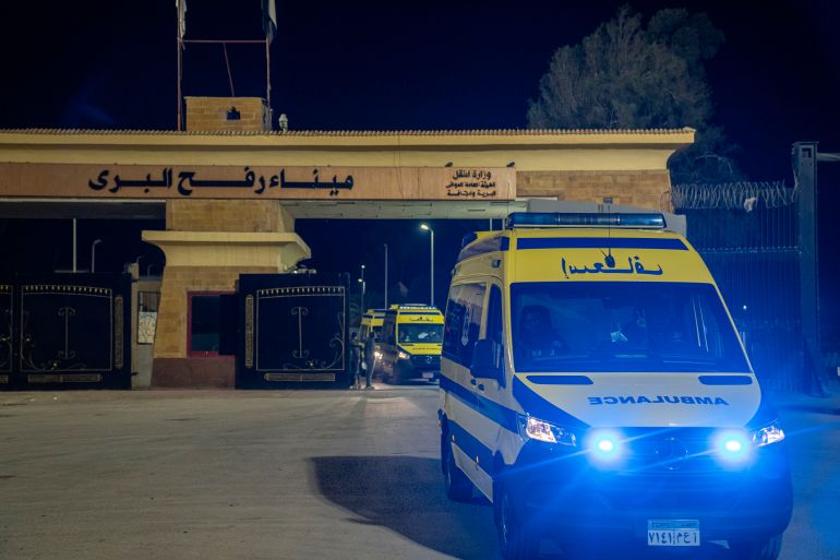RAFAH, EGYPT - FEBRUARY 1: Ambulances carrying injured Palestinians exit the Rafah crossing to receive treatment in Egypt, on February 1, 2025 in Rafah, Egypt. The transportation of patients from two hospitals in the north and south of Gaza will be coordinated with the World Health Organisation and monitored by the EU. (Photo by Ali Moustafa/Getty Images)