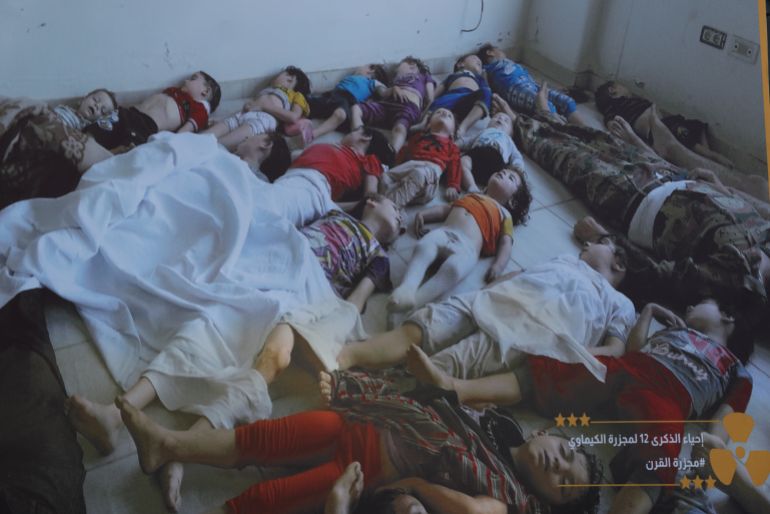 ZAMALKA, SYRIA - AUGUST 21: (EDITOR'S NOTE: Image depicts death.) A poster showing the bodies of children who perished in the chemical massacre on August 21, 2025 in Zamalka, Syria. On 21 August 2013 President Bashar al-Assad ordered strikes on two opposition-controlled areas of Ghouta, in the suburbs around Damascus. The rockets contained the chemical nerve agent Sarin which went on to kill up to 1700 people. The attack was the deadliest use of chemical weapons since the Iran-Iraq War. (Photo by Ali Haj Suleiman/Getty Images)