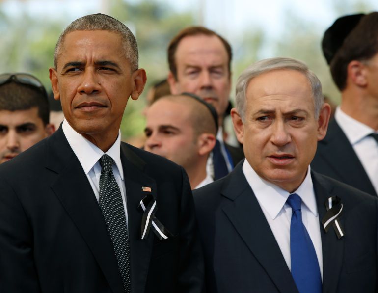 JERUSALEM, ISRAEL - SEPTEMBER 30: U.S. President Barack Obama and Israeli Prime Minister Benjamin Netanyahu look onduring the funeral of Shimon Peres at Mount Herzl Cemetery on September 30, 2016 in Jerusalem, Israel. World leaders and dignitaries from 70 countries attended tthe state funeral of Israel's ninth president, Shimon Peres, in Jerusalem on Friday, after thousands of Israelis paid their last respects to the elder statesman who died on Wednesday. (Photo by Abir Sultan- Pool/Getty Images)
