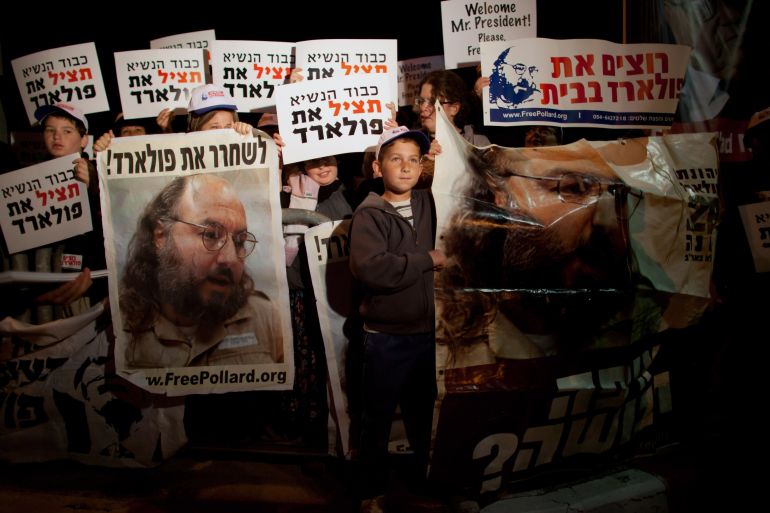 JERUSALEM, ISRAEL - MARCH 19: (ISRAEL OUT) Israelis protest against US President Barack Obama as they call for the release of Jonathan Pollard, a Jewish American who was jailed for life in 1987 on charges of spying on the United States, during a demonstration outside the Israeli President's residence on March 19, 2013 in Jerusalem, Israel. Obama will make his first visit as President to the region tomorrow, and his itinerary will include meetings with the Palestinian and Israeli leaders as well as a visit to the Church of the Nativity in Bethlehem. (Photo by Uriel Sinai/Getty Images)