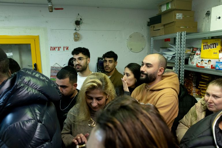 getty_6a25cf2ea0-1780862766 BE'ER SHEVA, ISRAEL - MARCH 29: People take a cover in a bomb shelter in a gas station as siren warning for ballistic missile launched from Iran is activated on March 29, 2026 in Central Israel, Israel. Iran has continued firing waves of drones and missiles at Israel after the United States and Israel launched a joint attack on Iran early on February 28th. (Photo by Amir Levy/Getty Images)