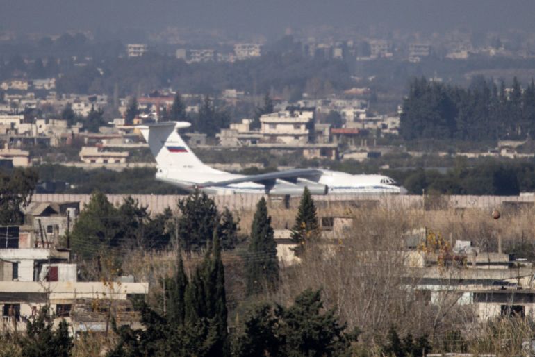 getty_6a29672dd1-1781098285 LATAKIA, SYRIA - DECEMBER 19: A Russian military aircrafter is seen on the runway at Hmeimim air base on December 19, 2024 in Latakia, Syria. The port city of Latakia on Syria's Mediterranean coast lies in the traditional heartland of the Alawite minority sect, from which the Assad family originates. In 2017, former president Bashar-al Assad leased the nearby Hmeimim air base to Russian ally forces, following their intervention in the Syrian civil war, which helped to turn the tide in Assad's favor. (Photo by Chris McGrath/Getty Images)