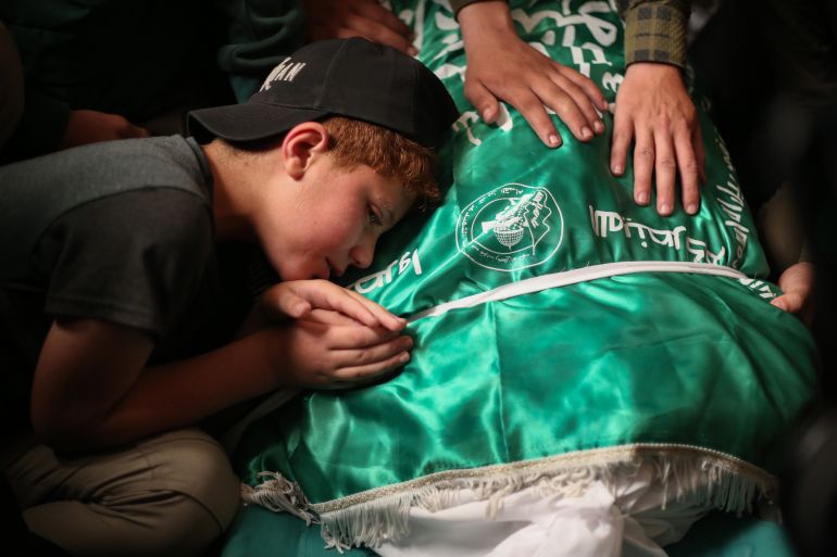getty_6a3adc040b-1782242308 GAZA CITY, GAZA - MAY 16: (EDITOR'S NOTE: Image depicts death) People mourn during a funeral held for Izz ad-Din al-Haddad, commandeer of Hamas's military wing, and his wife and daughter on May 16, 2026 at the Al-Aqsa Martyrs Mosque in Gaza City, Gaza. The three were killed last night in an Israeli air strike on their vehicle as it drove away from a residential building that was also targeted. (Photo by Ahmad Hasaballah/Getty Images)