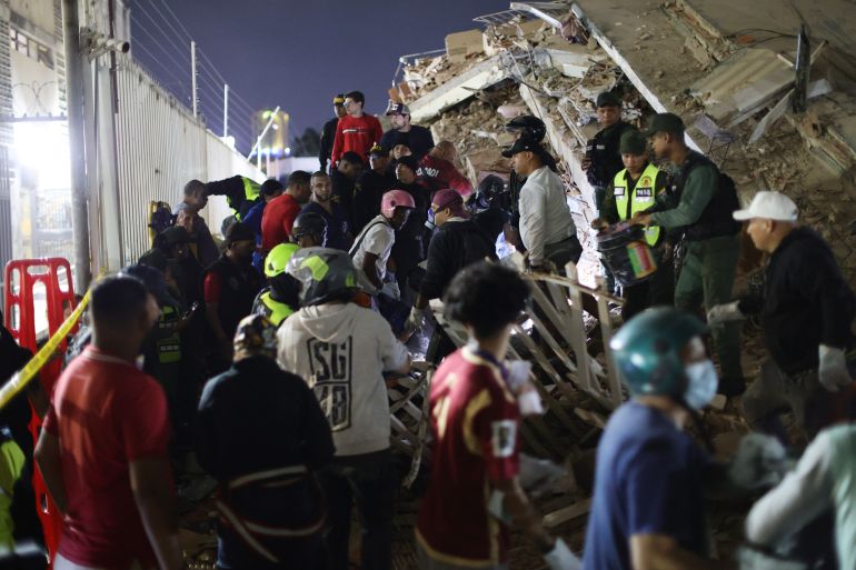 CARACAS, VENEZUELA - JUNE 24: Responders search for victims in a demolished building at San Bernardino after a magnitude 7.2 earthquake struck Venezuela and other regions in the Caribbean on June 24, 2026 in Caracas, Venezuela. According to the U.S. Geological Survey (USGS), the main earthquake was followed by a 7.5-magnitude aftershock less than a minute later; although some buildings collapsed, the number of victims remains unknown. (Photo by Jesus Vargas/Getty Images)