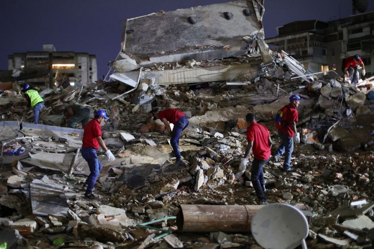 CARACAS, VENEZUELA - JUNE 24: Responders search for victims in a demolished building at San Bernardino after a magnitude 7.2 earthquake struck Venezuela and other regions in the Caribbean on June 24, 2026 in Caracas, Venezuela. According to the U.S. Geological Survey (USGS), the main earthquake was followed by a 7.5-magnitude aftershock less than a minute later; although some buildings collapsed, the number of victims remains unknown. (Photo by Jesus Vargas/Getty Images)