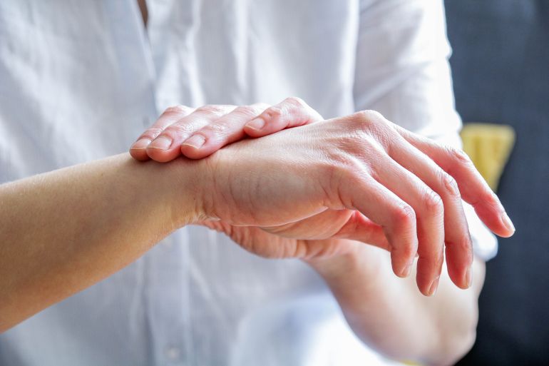 gettyimages-1392122855-1745237472 Female hands, close up, skin condition, eczema