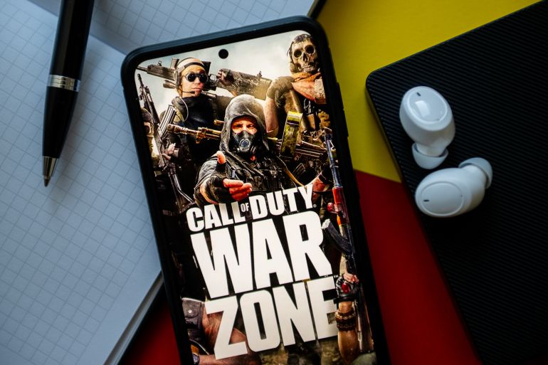 POLAND - 2023/11/02: In this photo illustration a Call of Duty War Zone logo seen displayed on a smartphone. (Photo Illustration by Mateusz Slodkowski/SOPA Images/LightRocket via Getty Images)