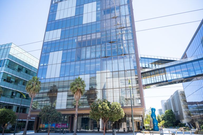 gettyimages-2232220644-1763484306 Headquarters of artificial intelligence company OpenAI with elevated glass skybridge and blue abstract sculpture on a sunny day, San Francisco, California, August 14, 2025. (Photo by Smith Collection/Gado/Getty Images)