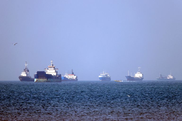 iran113-1780844791 In this picture obtained from Iran's ISNA news agency on May 4, 2026, vessels are pictured anchored in the Strait of Hormuz off Bandar Abbas in southern Iran. Iran's Revolutionary Guards on May 4 denied that any commercial ships had crossed the Strait of Hormuz, after the US military earlier said two US-flagged merchant vessels had transited through the vital waterway. (Photo by Amirhossein KHORGOOEI / ISNA / AFP) /