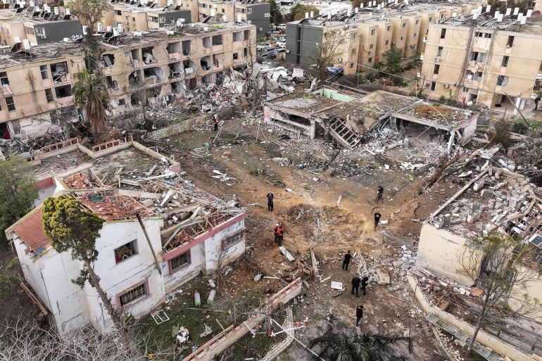 iran15-1780844767 A drone view shows a damage in a residential neighbourhood, following a night of Iranian missile strikes which injured dozens of Israelis, amid the U.S.-Israel conflict with Iran, in Dimona, southern Israel March 22, 2026. REUTERS/Roei Kastro TPX IMAGES OF THE DAY