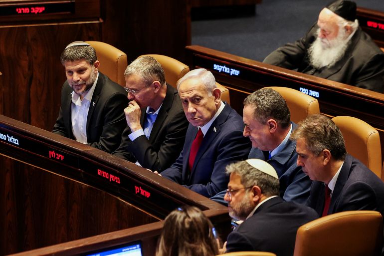 reuters_6881a769-1753327465 Israeli Prime Minister Benjamin Netanyahu, Finance Minister Bezalel Smotrich, Defense Minister Israel Katz and National Security Minister Itamar Ben-Gvir attend a discussion at the plenum in the Knesset, Israel's parliament, in Jerusalem, July 23, 2025. REUTERS/Ronen Zvulun