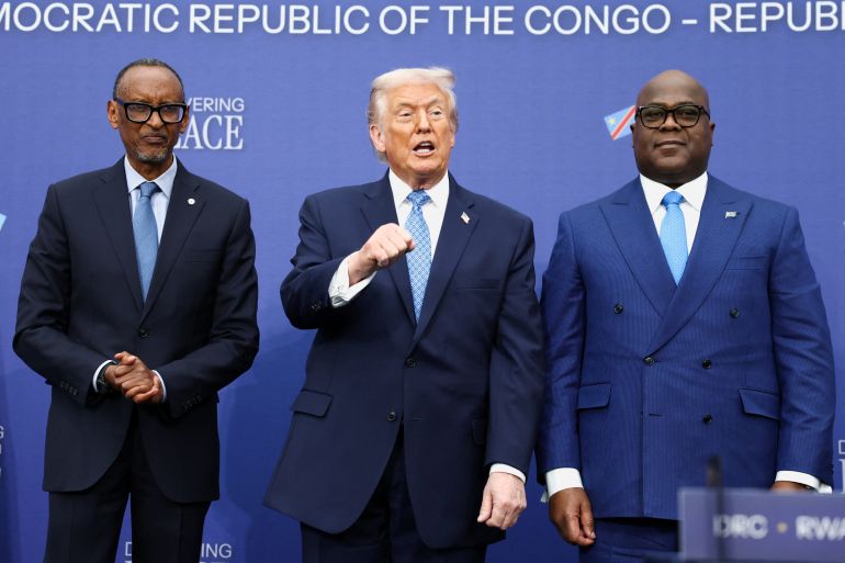 reuters_6931e3e5-1764877285 U.S. President Donald Trump, President of the Democratic Republic of the Congo Felix Tshisekedi and President of Rwanda Paul Kagame pose for a picture following a signing ceremony at the U.S. Institute of Peace in Washington, D.C., U.S., December 4, 2025. REUTERS/Kevin Lamarque