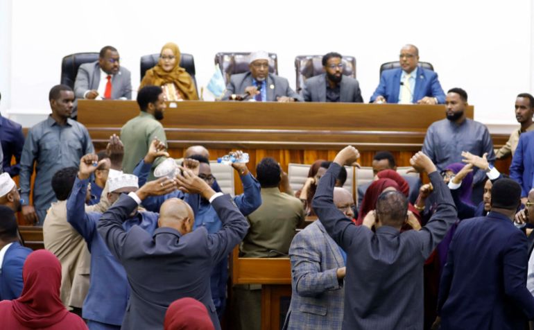 Somali opposition lawmakers protest plans to amend five chapters of the Provisional Federal Constitution during a joint session of Somalia’s bicameral parliament in Mogadishu, Somalia, January 28, 2026. REUTERS/Feisal Omar