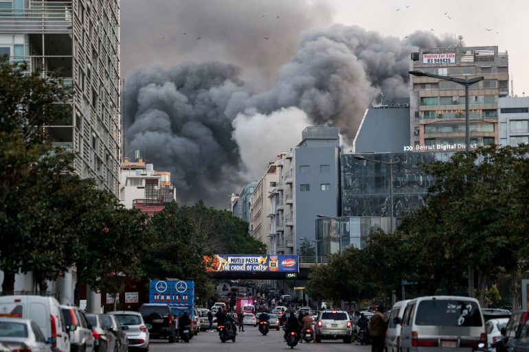 reuters_6a0ffc3f-1779432511 FILE PHOTO: Smoke rises after an Israeli strike in central Beirut's Bachoura neighbourhood, following an escalation between Hezbollah and Israel, amid the U.S.-Israeli conflict with Iran, in Beirut, Lebanon, March 12, 2026. REUTERS/Claudia Greco/File Photo