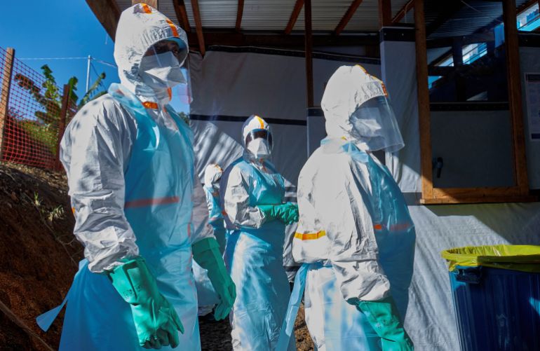 reuters_6a1c937e-1780257662 Health workers dress up in personal protective equipment (PPE) at the Evangelical Medical Center, one of the facilities at the forefront of the response to the Ebola outbreak, as agencies intensify efforts to contain a new Ebola outbreak caused by the Bundibugyo virus strain, in Bunia, Ituri province, Democratic Republic of Congo, May 31, 2026. REUTERS/Gradel Muyisa Mumbere