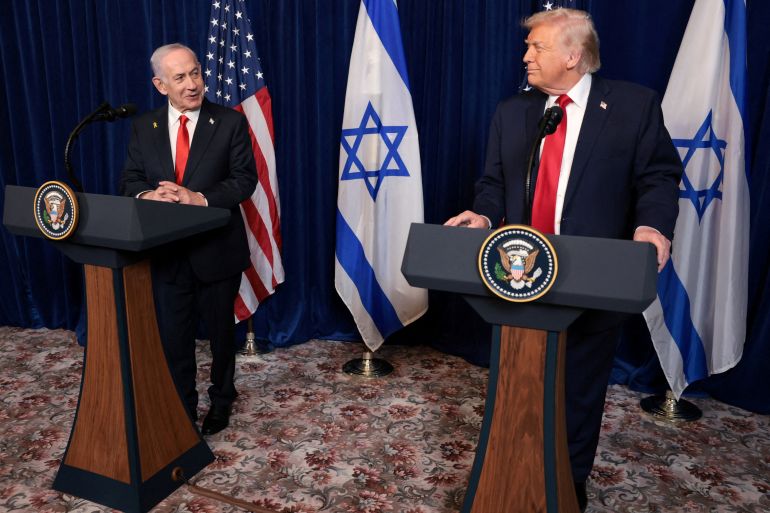 FILE PHOTO: U.S. President Donald Trump and Israeli Prime Minister Benjamin Netanyahu hold a press conference after meeting at Trump’s Mar-a-Lago club in Palm Beach, Florida, U.S., December 29, 2025. REUTERS/Jonathan Ernst/File Photo
