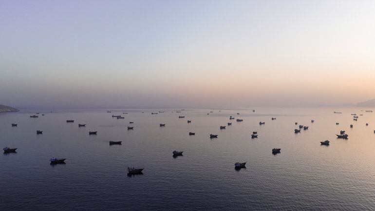 A drone view of vessles anchored in the Strait of Hormuz as seen from Musandam, Oman, June 3, 2026. REUTERS/Stringer