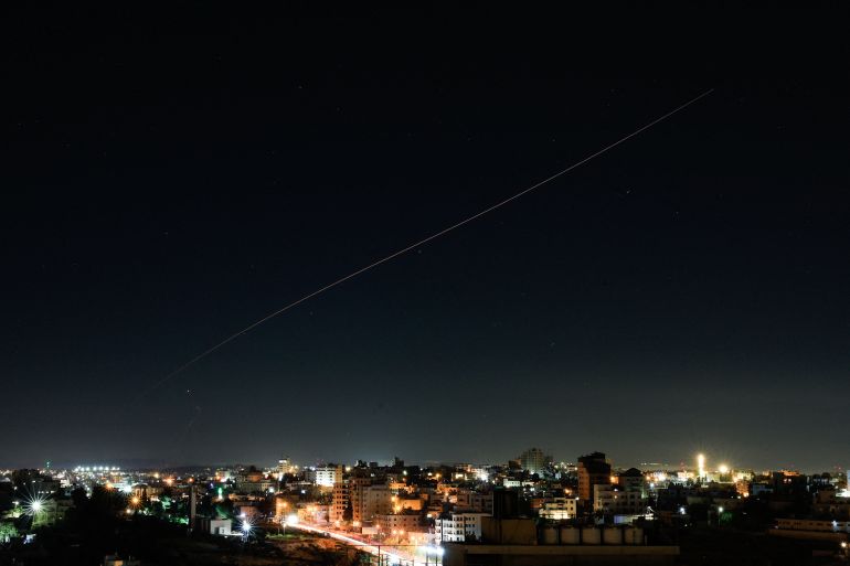 reuters_6a25d002-1780862978 An Iranian missile flies in the sky over Israel, as seen from Hebron, in the Israeli-occupied West Bank, June 7, 2026. REUTERS/Mussa Qawasma