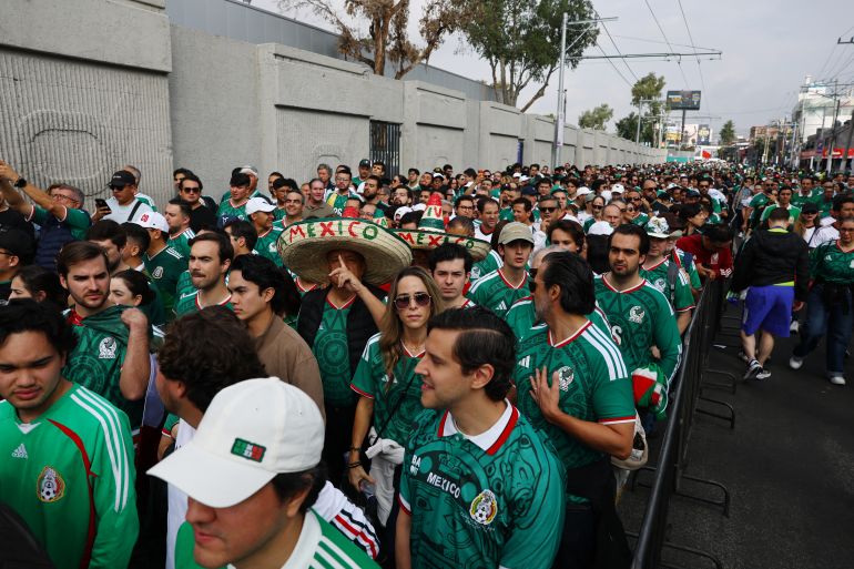 reuters_6a2ad80c-1781192716 Soccer Football - FIFA World Cup 2026 - Group A - Mexico v South Africa - Estadio Azteca, Mexico City, Mexico - June 11, 2026 Mexico fans queue to enter the stadium before the match REUTERS/Kai Pfaffenbach