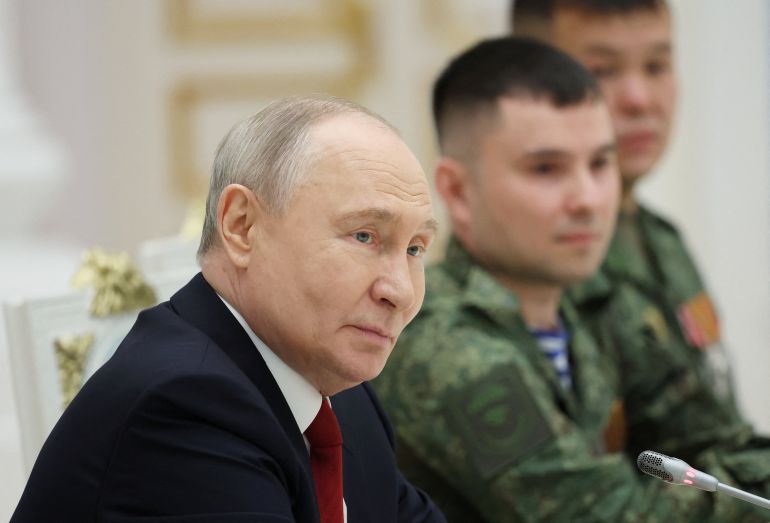reuters_6a2d21e0-1781342688 Russia's President Vladimir Putin attends a meeting with service members of the Russian armed forces involved in the country's military campaign in Ukraine, following an award ceremony marking Russia Day national holiday at the Kremlin in Moscow, Russia, June 12, 2026. Sputnik/Alexander Kazakov/Pool via REUTERS ATTENTION EDITORS - THIS IMAGE WAS PROVIDED BY A THIRD PARTY.
