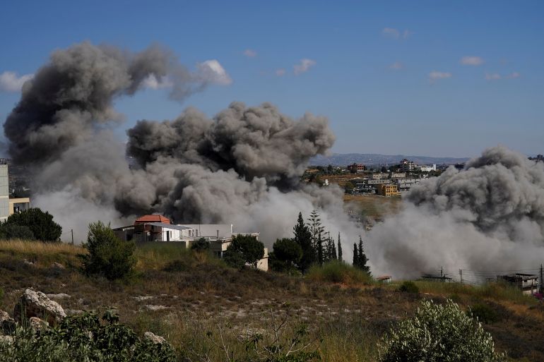 reuters_6a2dd060-1781387360 Smoke billows from southern Lebanon following an Israeli strike, as seen from Nabatieh, Lebanon, June 13, 2026. REUTERS/Stringer
