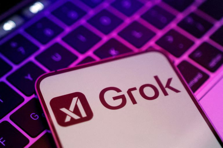 reuters_6a2e8ae9-1781435113 FILE PHOTO: xAI and Grok logos are seen in this illustration taken, February 16, 2025. REUTERS/Dado Ruvic/Illustration/File Photo