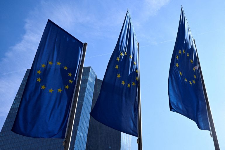 reuters_6a2f8e01-1781501441 FILE PHOTO: European Union flags flutter outside the European Central Bank (ECB) headquarters in Frankfurt, Germany, March 19, 2026. REUTERS/Jana Rodenbusch/File Photo