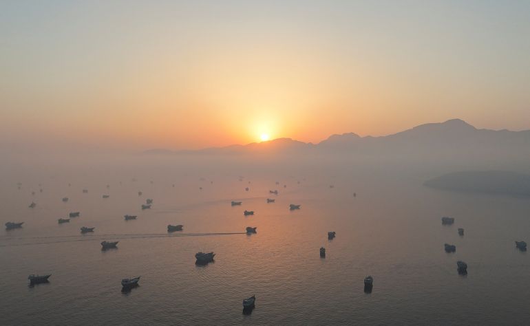 reuters_6a2fcf7c-1781518204-1 A drone view shows vessels in the Strait of Hormuz, as seen from Musandam, Oman, June 15, 2026. REUTERS/Stringer